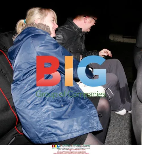 Chris Evans and mystery woman at Christmas party