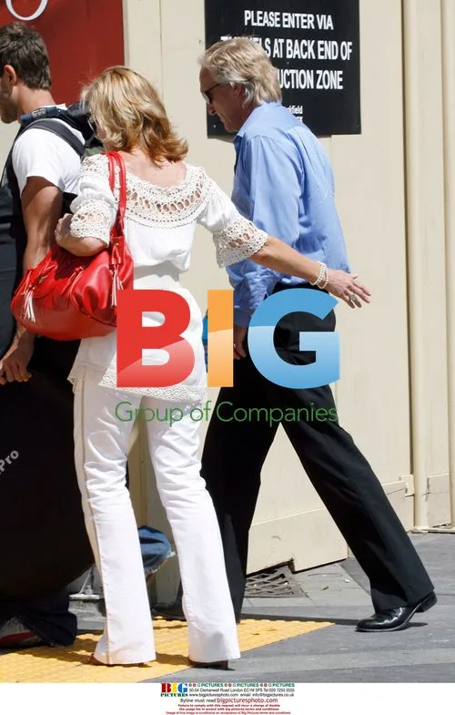 Greg Norman with mystery woman