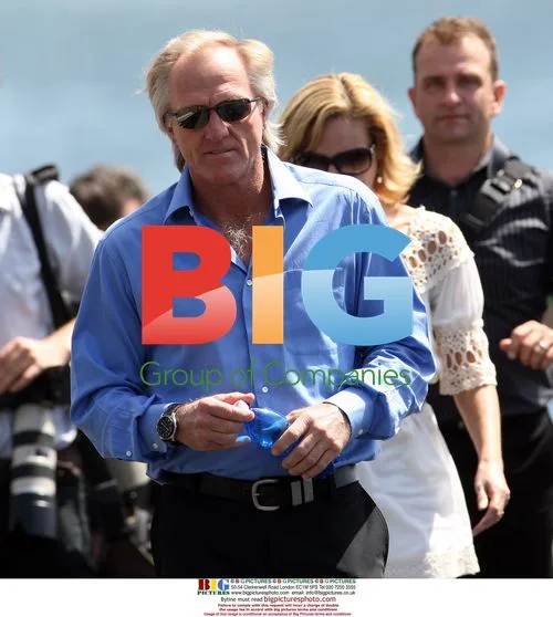 Greg Norman and mystery woman