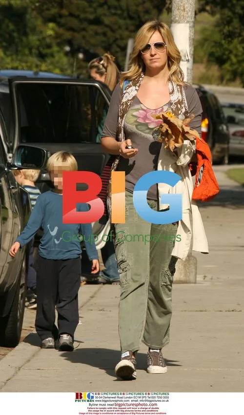 Penny Lancaster-Stewart and son at park