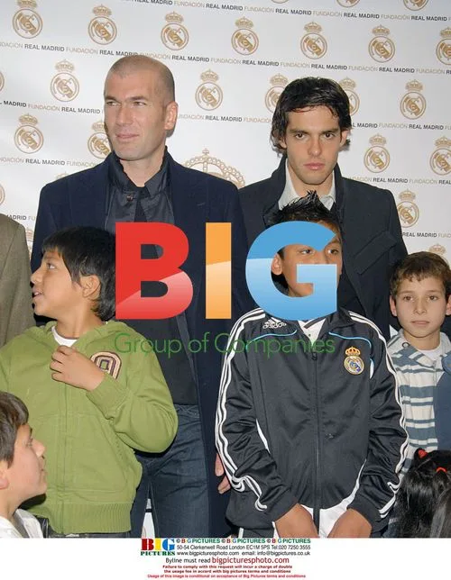 Kaka and Zidane give Christmas gifts to kids in Madrid