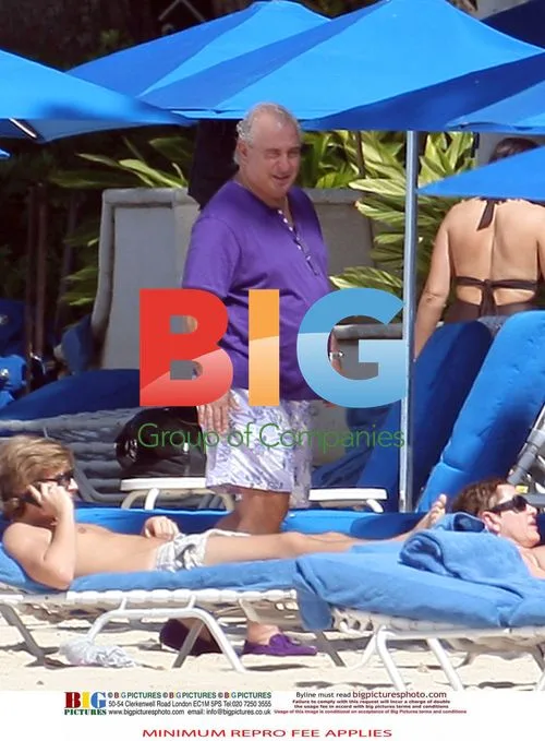 Sir Philip Green Relaxes in Barbados
