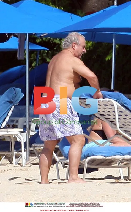 Sir Philip Green relaxing in Barbados