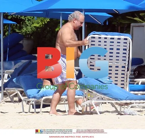 Sir Philip Green Relaxing on Barbados Beach