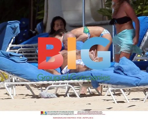 Sir Philip Green relaxing in Barbados