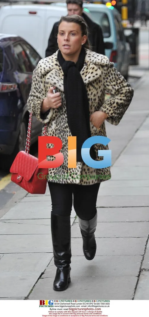 Coleen Rooney Out Shopping with Baby Kai