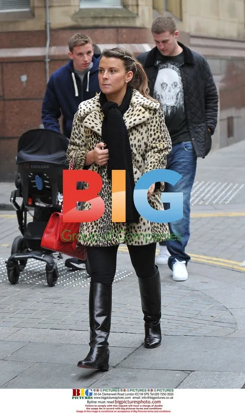 Coleen Rooney out with baby Kai