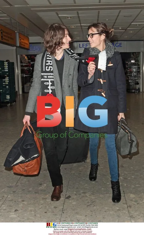 Alexa Chung and Alex Turner arrive at Heathrow