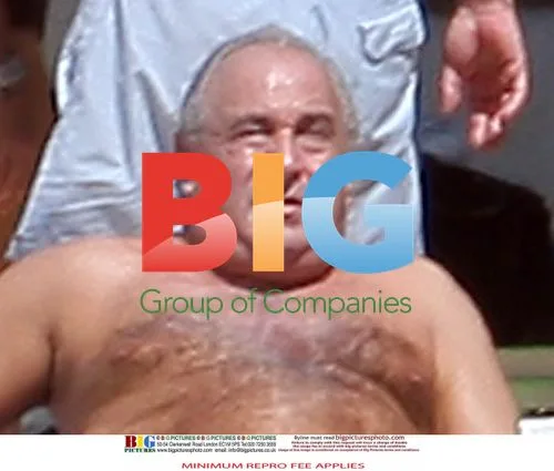 Sir Philip Green Relaxing in Barbados