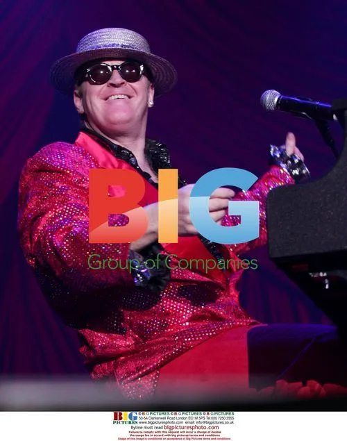 Rocket Man Impersonator Performs
