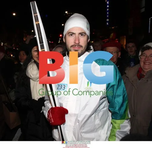 Jason Reitman waits with Olympic torch in Toronto
