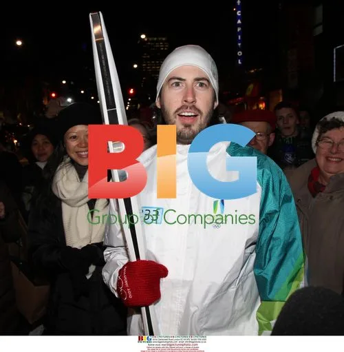 Jason Reitman waits for father with Olympic torch