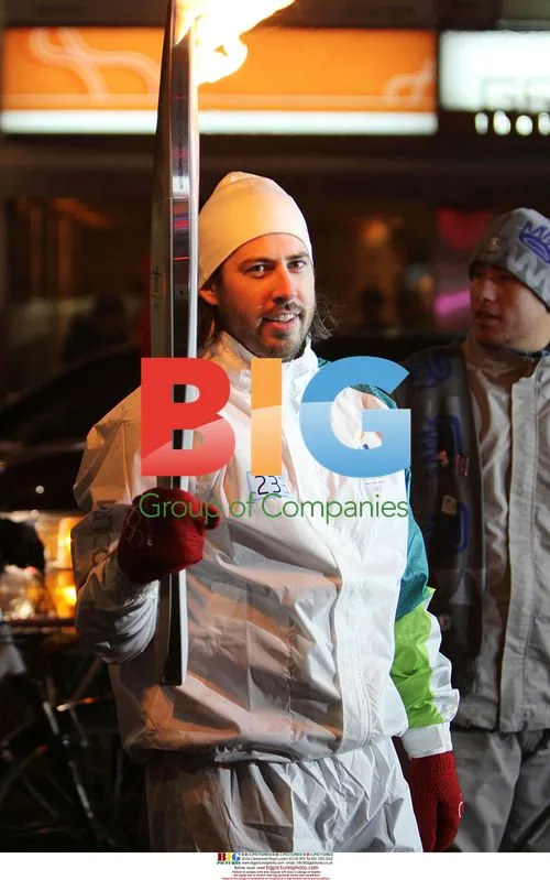 Jason Reitman waits for Olympic torch in Toronto