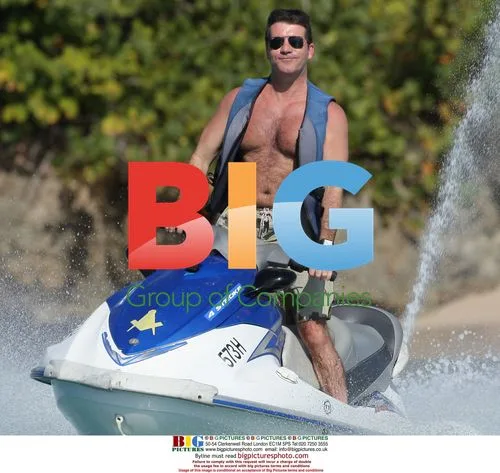 Simon Cowell on jet ski in Caribbean