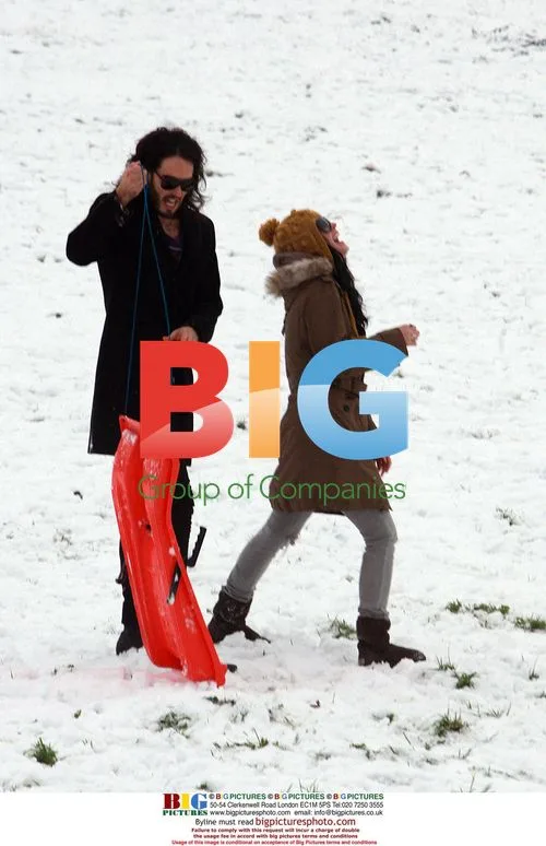 Russell Brand and Katy Perry go sledding in London