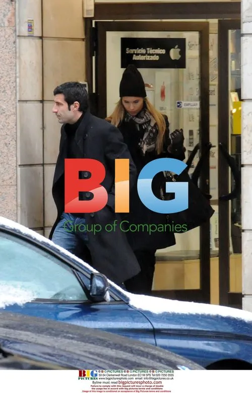 Luis Figo and wife Helen Svedin shopping in Madrid