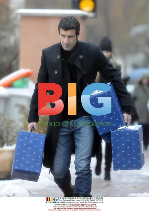 Luis Figo and wife Helen Svedin shopping in Madrid