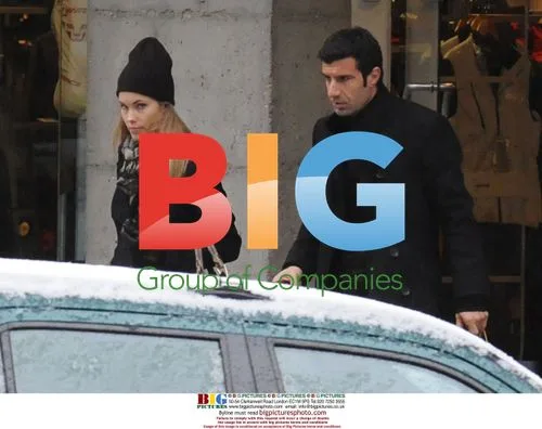 Luis Figo and Helen Svedin shopping in Madrid