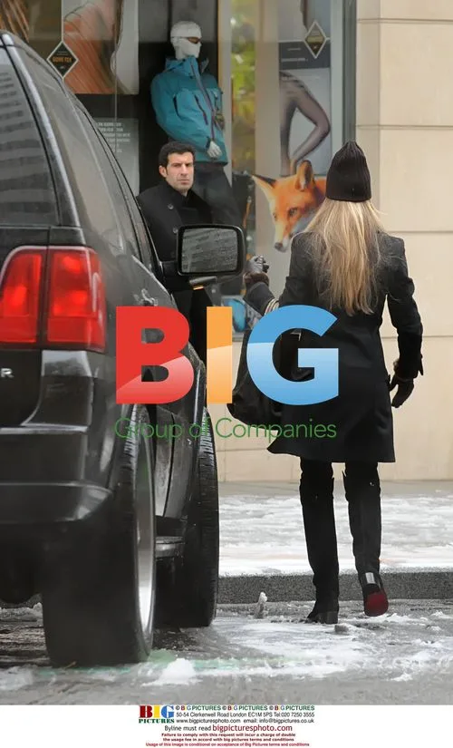 Luis Figo and Helen Svedin shopping in Madrid