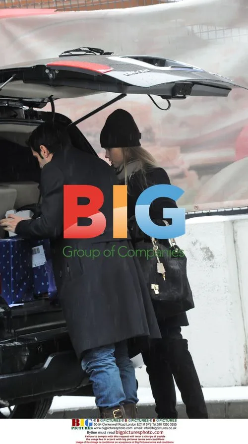 Luis Figo and Helen Svedin Shopping in Madrid