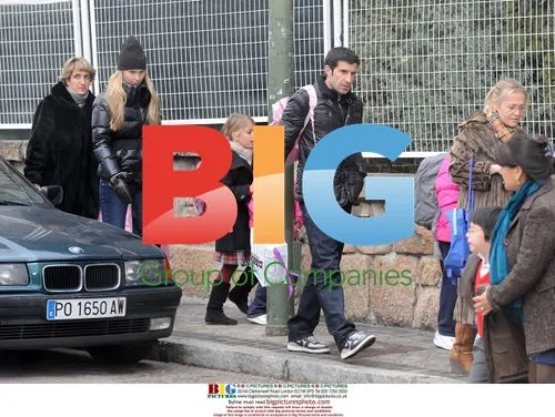 Luis Figo and Helen Svedin out shopping in Madrid