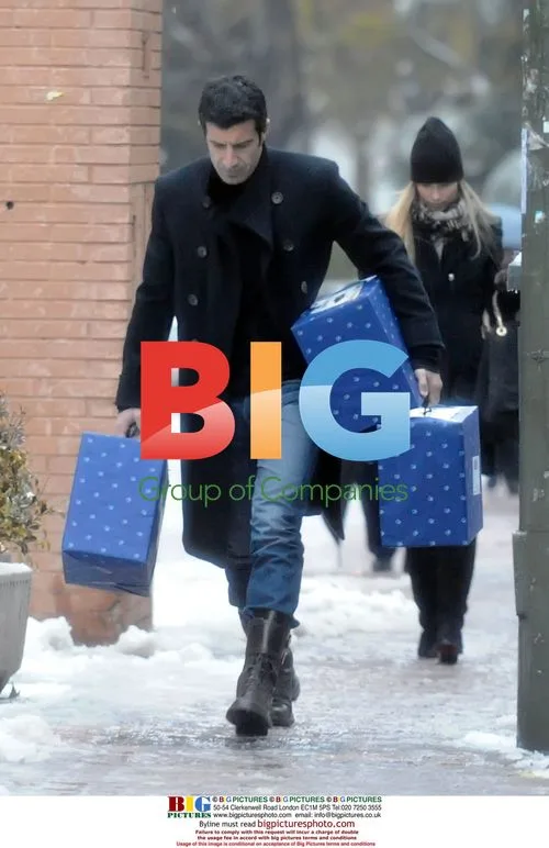 Luis Figo and wife Helen Svedin shopping in Madrid