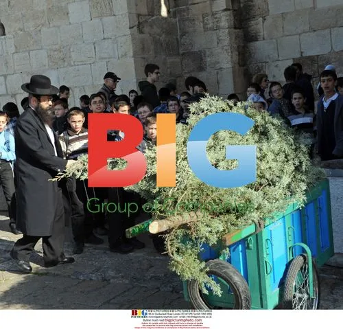 Ultra-Orthodox Jews and Arab Santa in Jerusalem