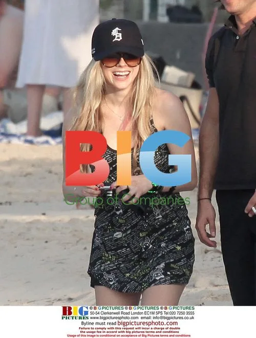 Avril Lavigne takes beach photos in St. Barthelemy