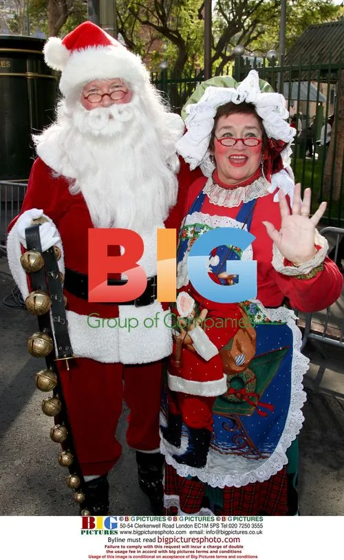 Santa Claus and Mrs. Claus at Christmas Eve for the Homeless