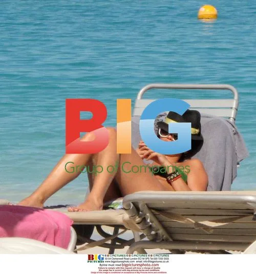 Thomas Kretschmann and Shermine Shahrivar on beach in St Barth