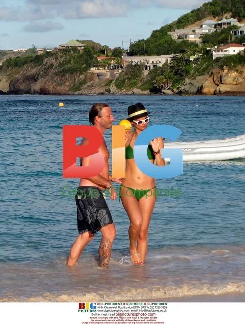 Thomas Kretschmann and Shermine Shahrivar on beach