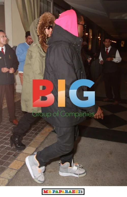 Kanye West and Amber Rose leaving the Grove
