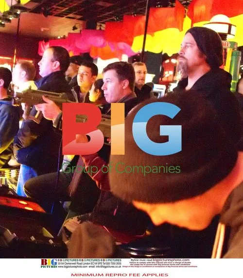 Brad Pitt and Maddox at Dave and Busters