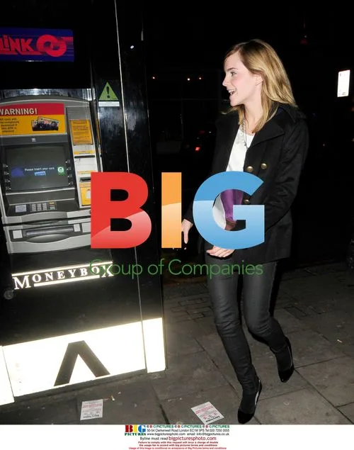 Emma Watson Searches for Cash in London