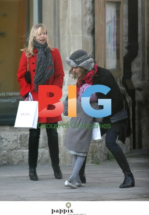 Trinny Woodhall and Liz Hurley out with kids