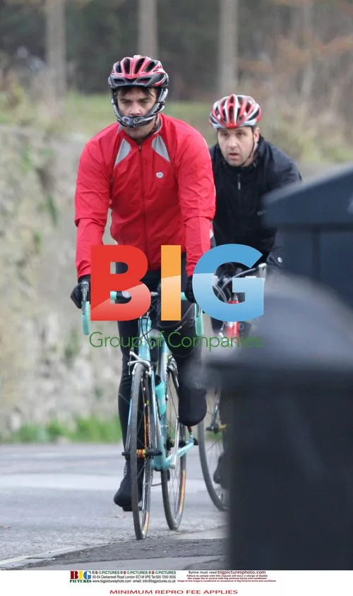 Robbie Williams tests new bike