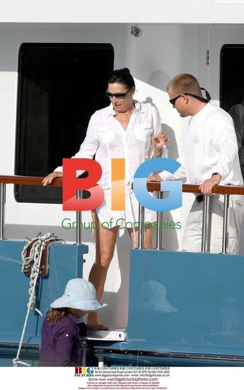 Anjelica Huston relaxes on Jimmy Buffett's boat
