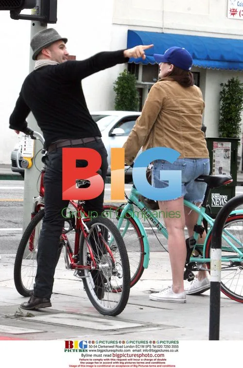 Billy Zane rides bike with girlfriend