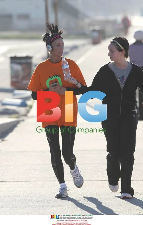 Katie Price and Peter Andre Jogging on Beach