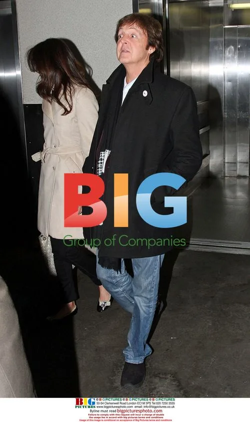 Paul McCartney and Nancy Shevell arrive at LAX