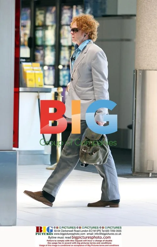Mick Hucknall Arrives at Perth Airport