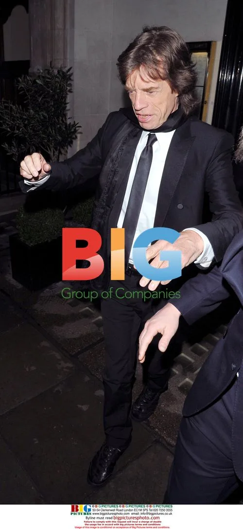 Mick Jagger Leaving Scotts with L'wren Scott