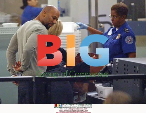 Serena Williams and Common depart LAX