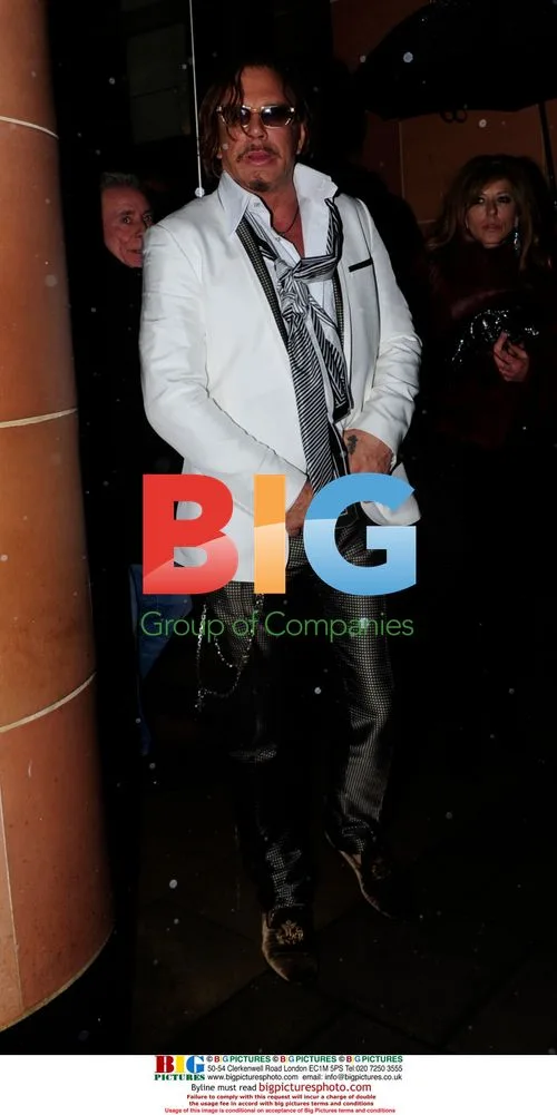 Micky Rourke leaves Cipriani with celebs