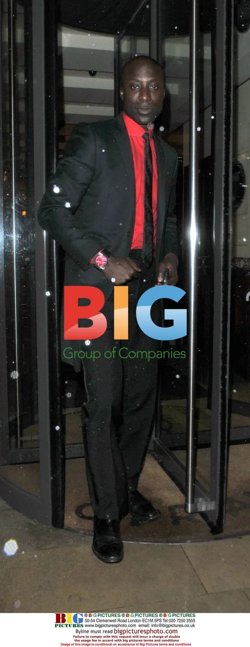 Micky Rourke leaving Cipriani with friends