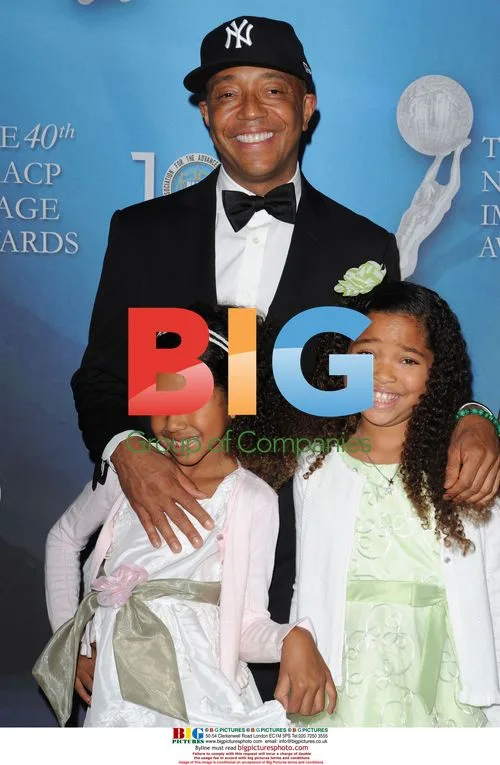 Russell Simmons & daughters at NAACP Image Awards