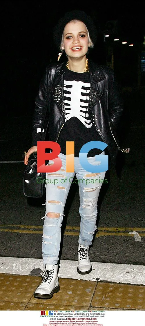 Pixie Geldof laughing with Henry Holland