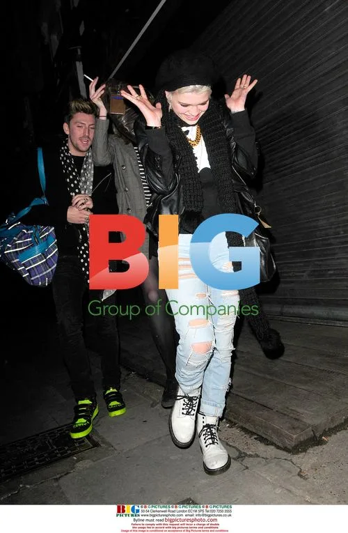 Pixie Geldof laughs with Henry Holland