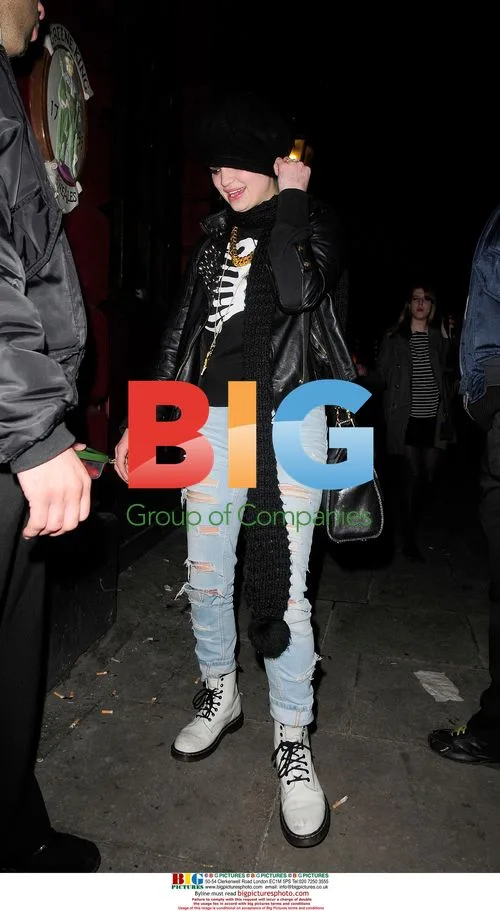 Pixie Geldof laughing with Henry Holland