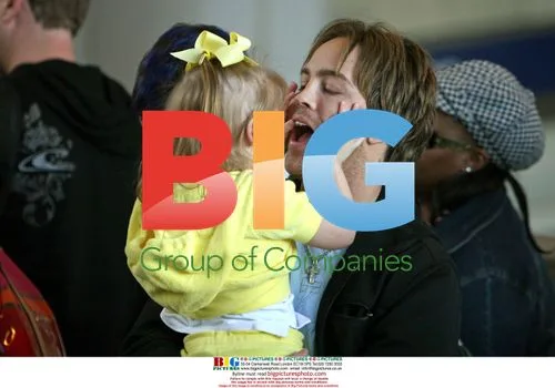 Larry Birkhead with Daughter Dannielynn at LAX